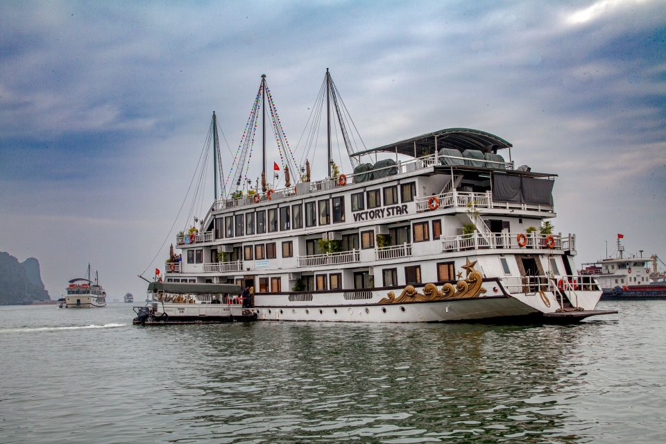 Passenger ship Victory Star cruising on scenic Halong Bay, Vietnam.