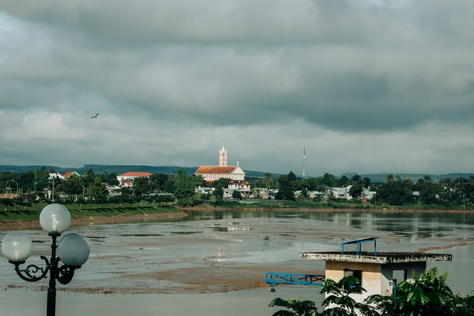 Beautiful landscape of Thahza Valley from Kon Tum, Vietnam with riverside view and moody sky.